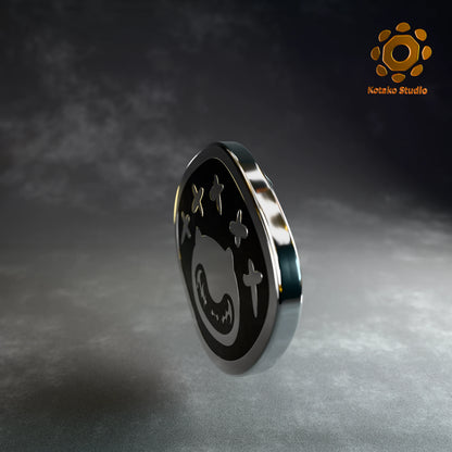 Side view of the Hololive Advent sterling silver pin with black vitreous enamel.