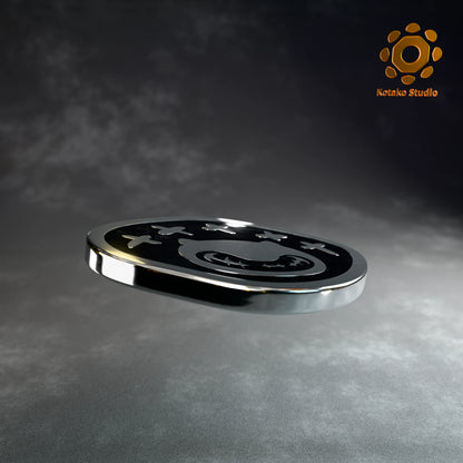 Angled view of the Hololive Advent sterling silver pin with black vitreous enamel.