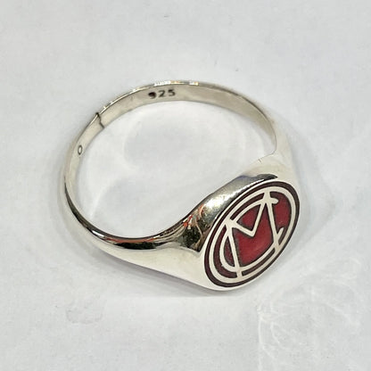 High-angle view of the Mori Calliope MC ring with red enamel, showing the '925' sterling silver stamp inside the band.