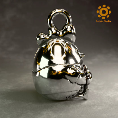 Polished sterling silver KFP Chicken pendant holding a quaso, inspired by Hololive's Takanashi Kiara. Side view.