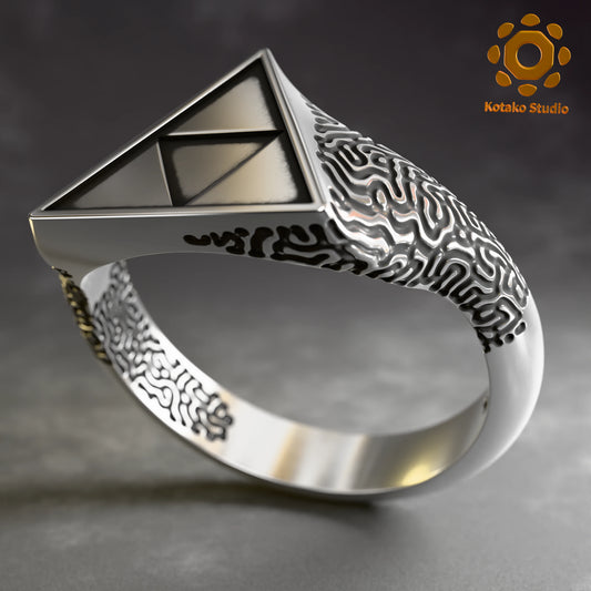 Sterling silver Zelda Triforce ring with an Ancient Shrine pattern inspired by Breath of the Wild. Angled front view.